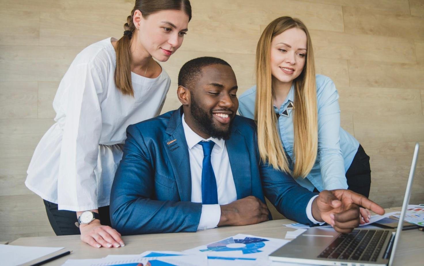Participants reviewing budget spreadsheets during workshop