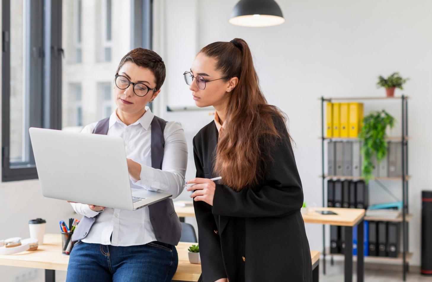 Participants working through financial planning exercises in a supportive learning environment